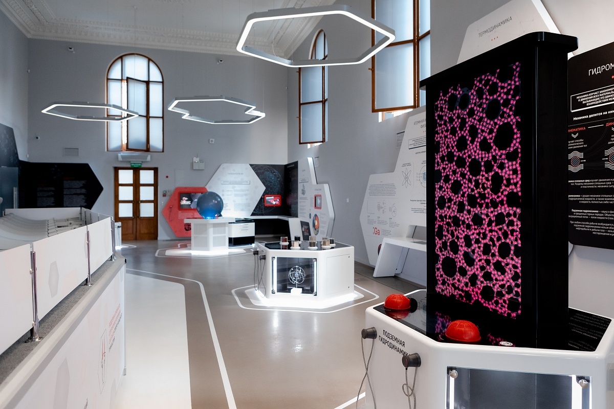 Museum visitors exploring interactive exhibits at the Oil Museum