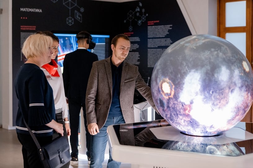 Museum visitors exploring interactive exhibits at the Oil Museum